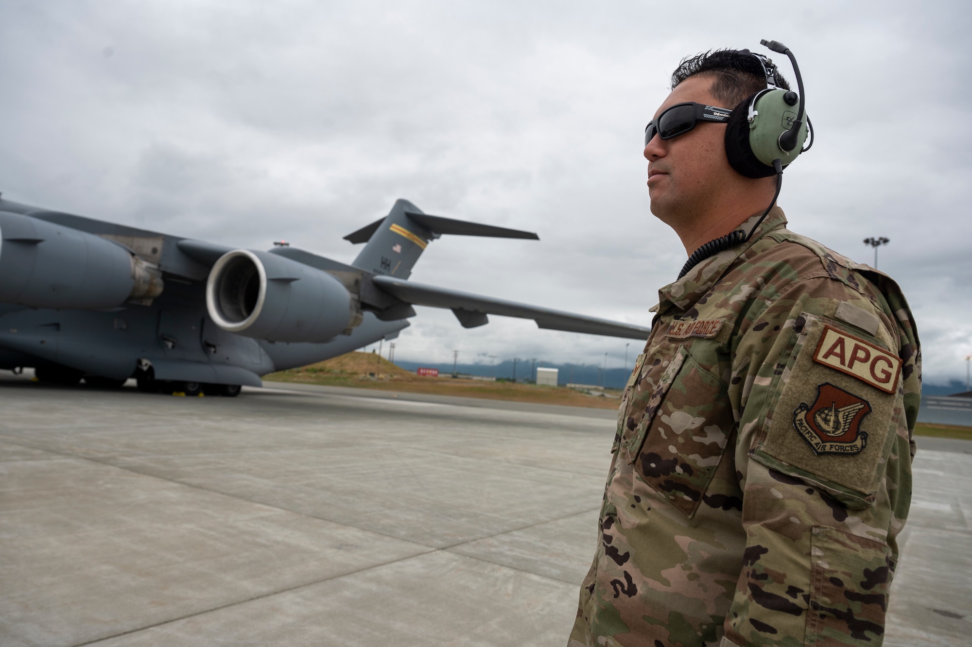 U.S. Air Force Staff Sgt. Nevin Keaulii, 204th Airlift Squadron aircraft mechanic, prepares a C-17 Globemaster III for a training sortie as part of AMALGAM DART 22-04 July 6, 2022, Joint Base Elmendorf-Richardson, Alaska.
