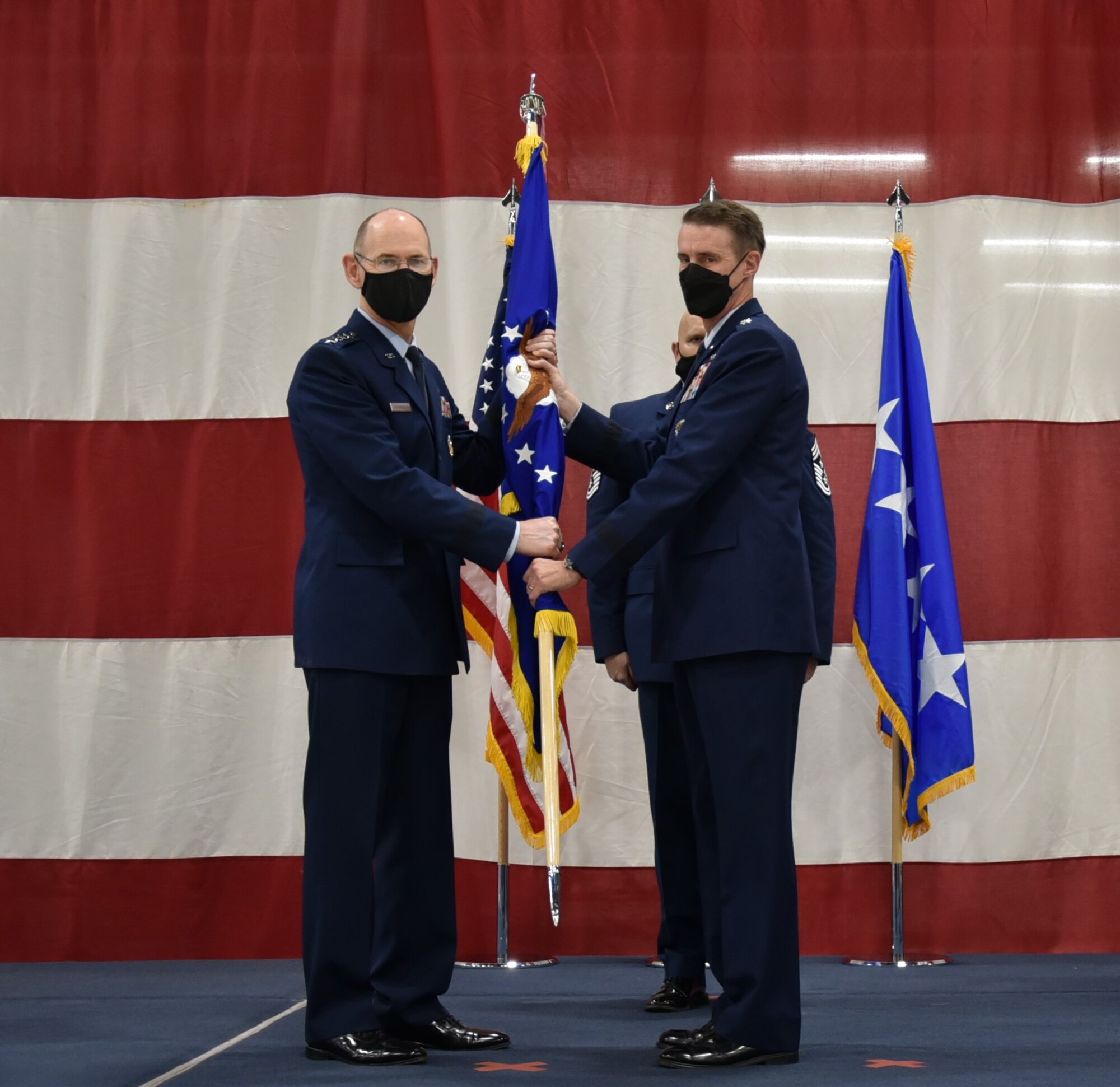220815-F-UR719-4018
Gen. Duke Z. Richardson, commander, Air Force Materiel Command (left) holds the Air Force Sustainment Center provisional flag with Lt. Gen. Tom D. Miller (right) during a change of command ceremony at Tinker Air Force Base, Oklahoma, Aug. 15, 2022.