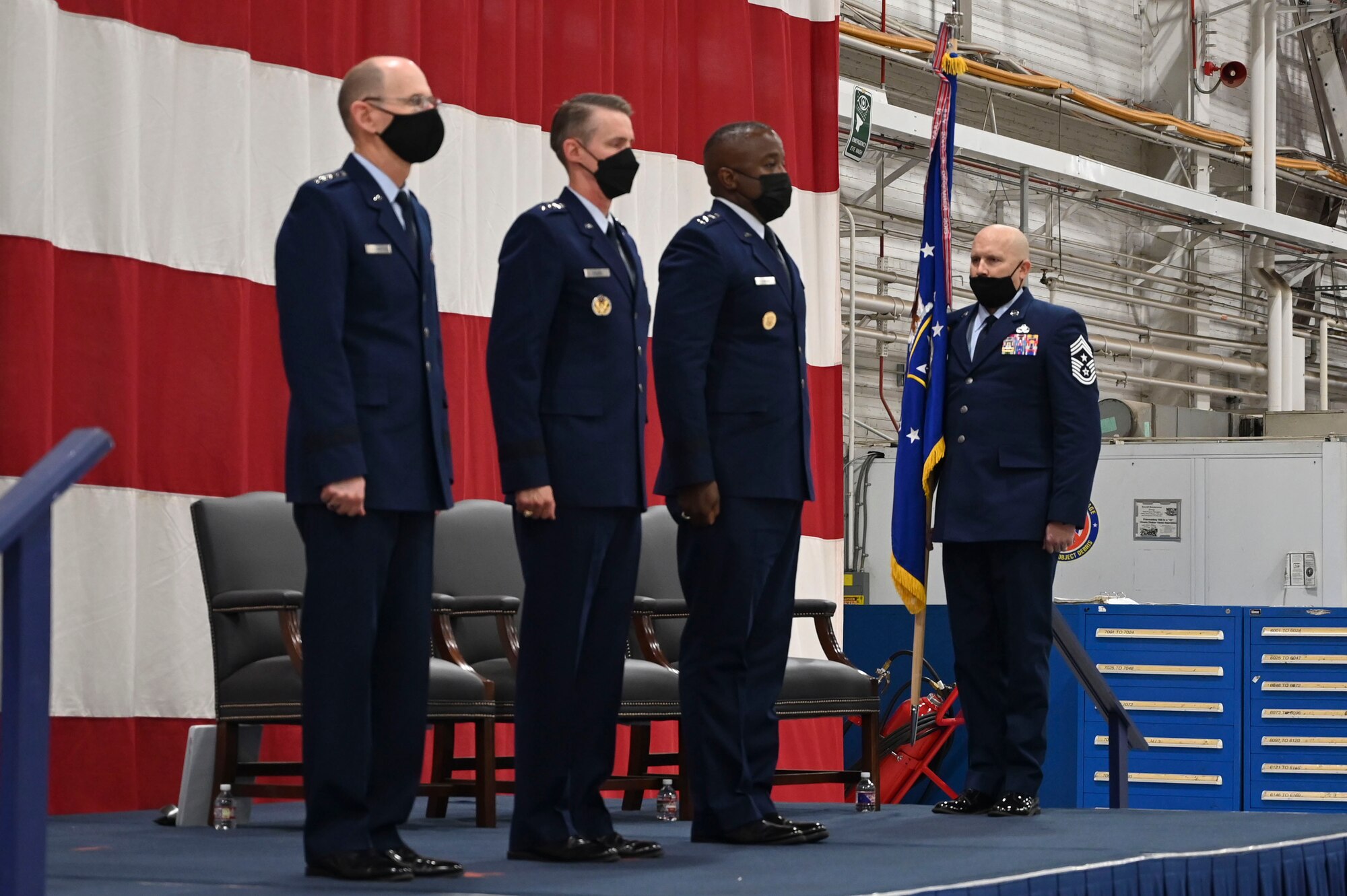220815-F-JC105-1077
Gen. Duke Z. Richardson, commander, Air Force Materiel Command, Lt. Gen Tom D. Miller, outgoing commander, Air Force Sustainment Center, Lt. Gen. Stacey T. Hawkins, incoming commander, Air Force Sustainment Center stand at attention as Chief Master Sgt. Robert C. Schultz, command chief, Air Force Sustainment Center delivers the guidon to be presented during the change of command ceremony gets underway at Tinker Air Force Base, Oklahoma, Aug. 15, 2022