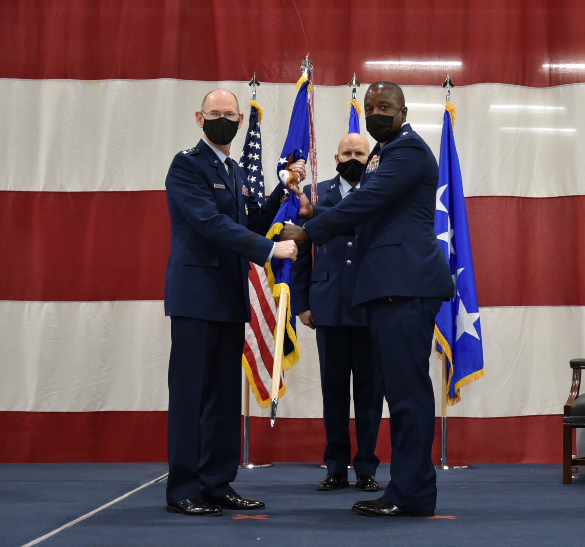 220815-F-UR719-4023
Gen. Duke Z. Richardson, commander, Air Force Materiel Command (left) holds the Air Force Sustainment Center provisional flag with Lt. Gen. Stacey T. Hawkins (right) during a change of command ceremony at Tinker Air Force Base, Oklahoma, Aug. 15, 2022.