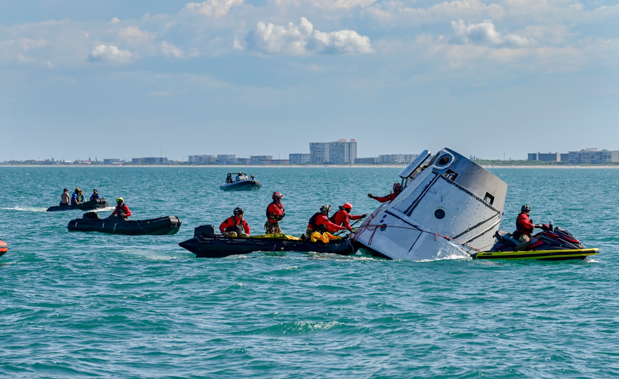 Navy Helicopters and Air Force Pararescue Forces Conduct Astronaut Recovery Exercise