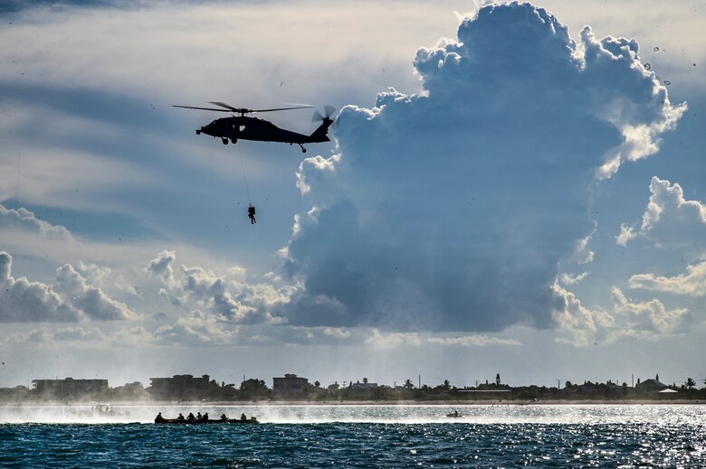 Navy Helicopters and Air Force Pararescue Forces Conduct Astronaut Recovery Exercise