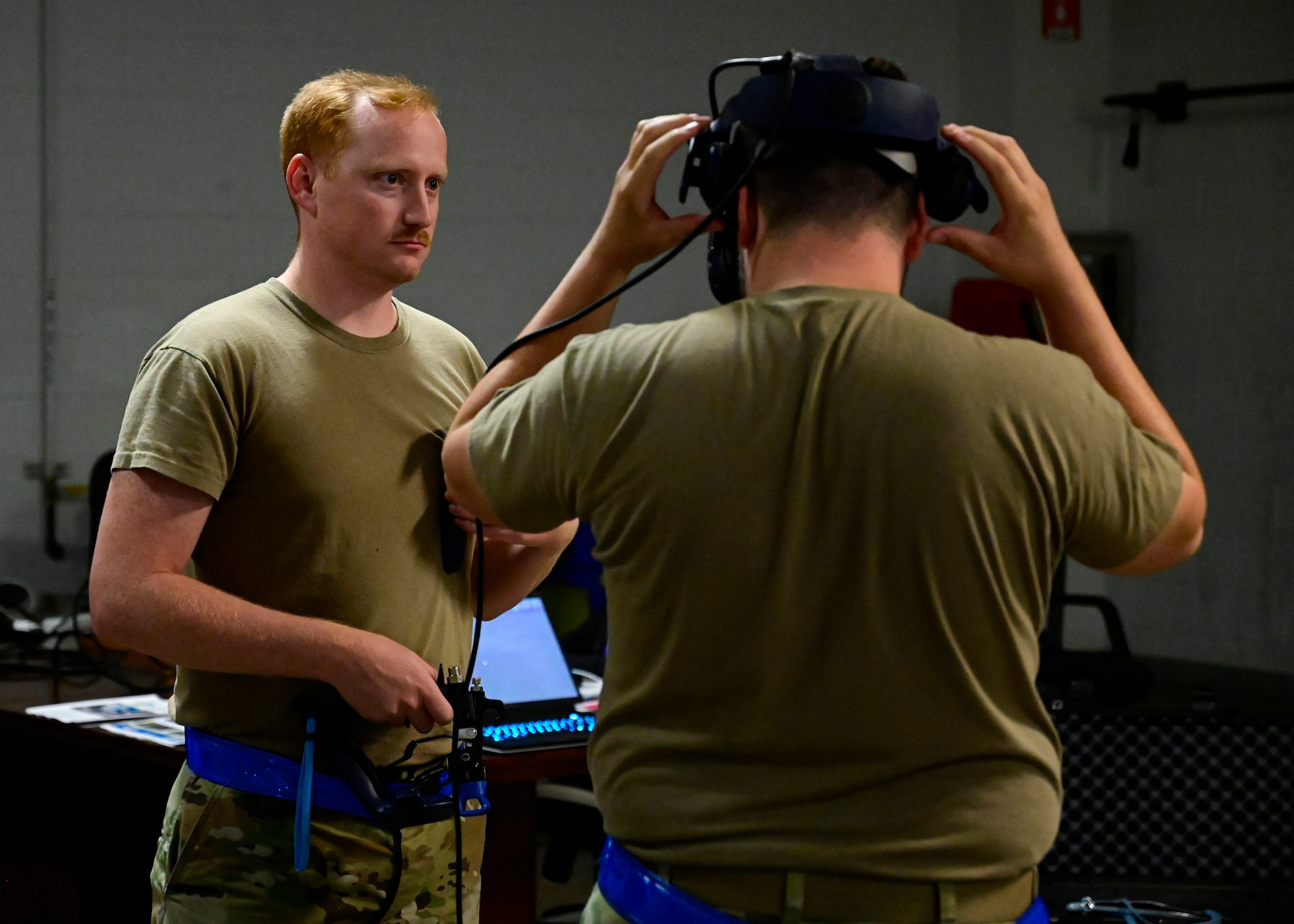 An Airman tests a virtual reality headset.