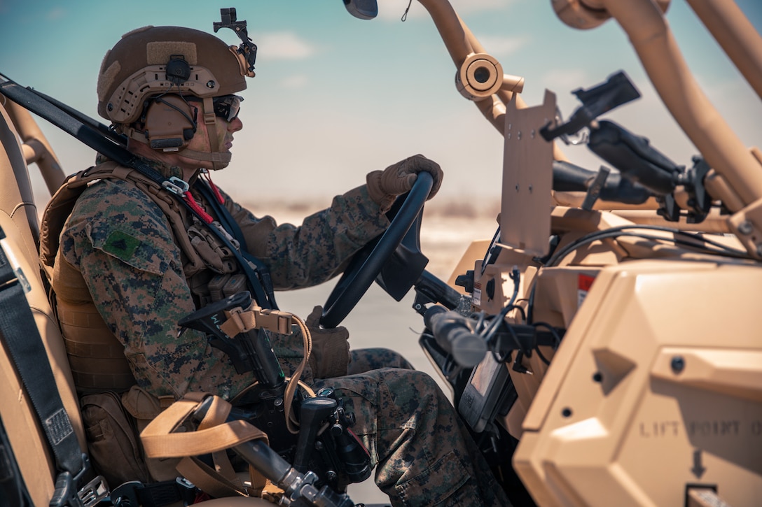 A U.S. Marine with 1st Battalion, 2nd Marine Regiment, 2nd Marine Division, operates a utility task vehicle at Yuma Proving Grounds, Arizona, April 22, 2022. 1/2 is tasked as the division's experimental infantry battalion to test new gear, operating concepts, and force structures. The unit's findings will help refine infantry battalions across the Marine Corps as we continue to push toward the end state of Force Design.