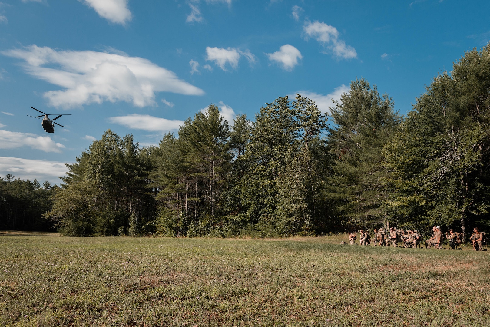 Airmen assigned to the New York Air National Guard’s 274th Air Support Operations Squadron based in Syracuse, part of the 107th Attack Wing, prepare for a CH-47F Chinook helicopter from the New York National Guard’s Bravo Company, 3rd Battalion, 126th Aviation to land during a tactical air control party training procedure in Upstate New York, Aug. 7, 2022.