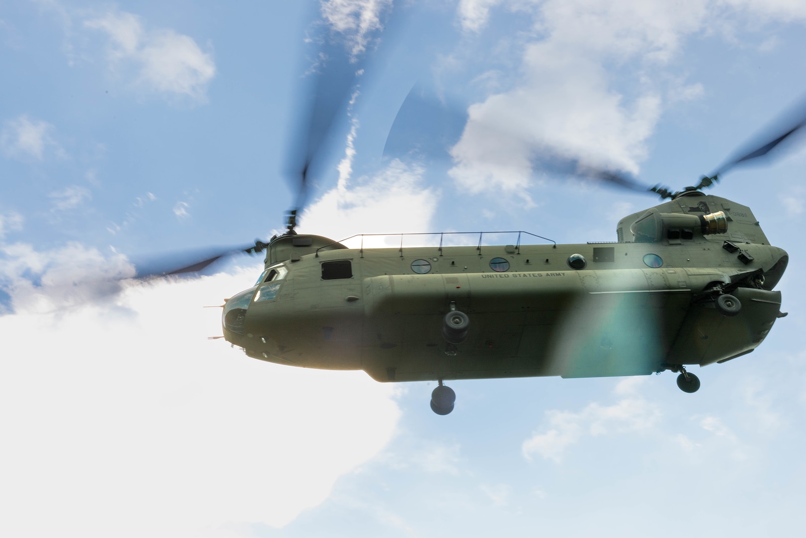 A CH-47F Chinook helicopter from the New York National Guard’s Bravo Company, 3rd Battalion, 126th Aviation, takes flight from a designated landing zone during a tactical air control party training procedure in Upstate N.Y., Aug. 7, 2022.