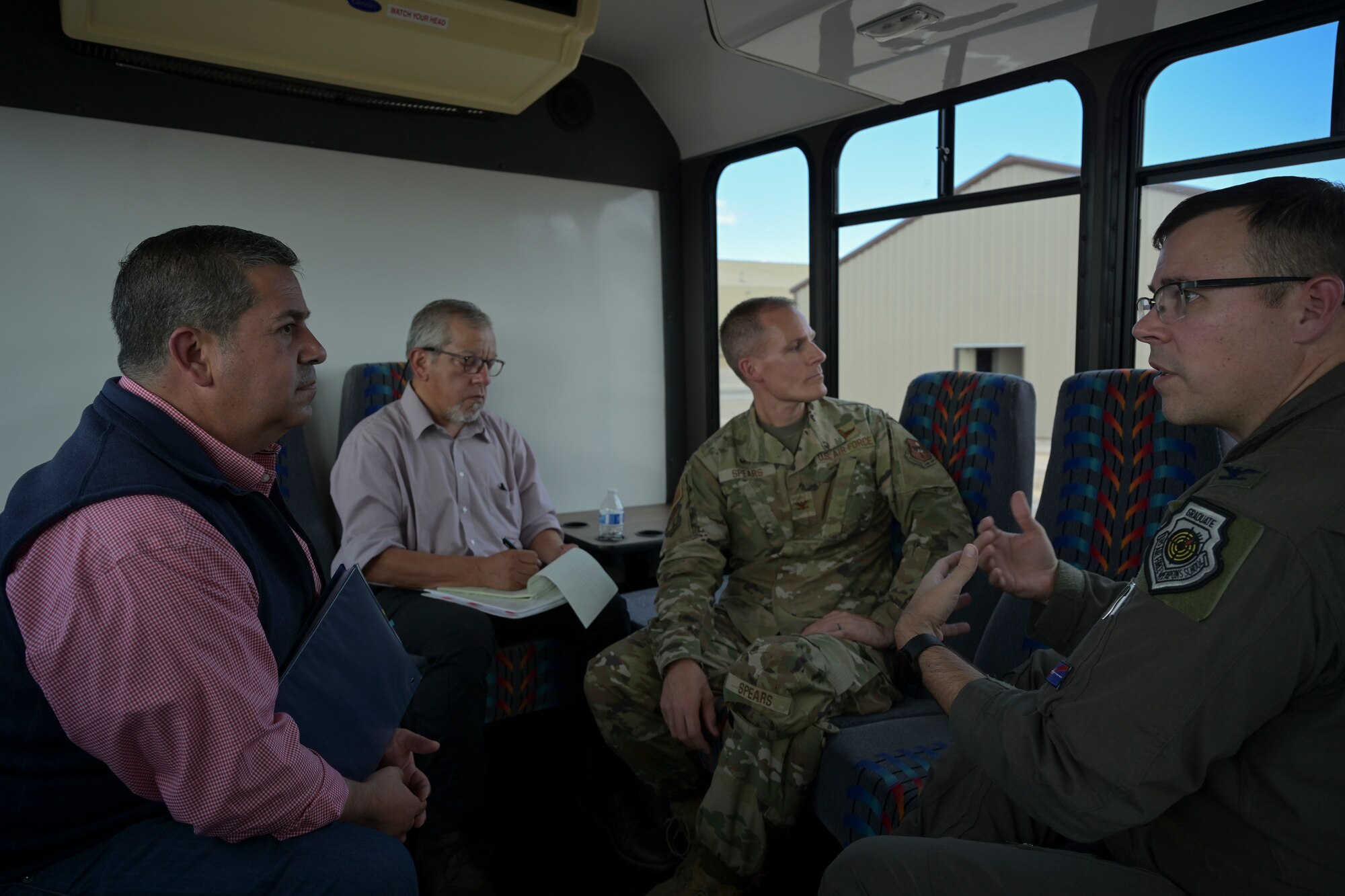 Sen. Ben Ray Lujan, of New Mexico, receives a brief from Col. Nicholas Pederson, 49th Wing vice commander, on the production of an MQ-9 campus on Holloman Air Force Base, New Mexico, August 15, 2022. The 49th Wing builds the backbone of combat airpower by training combat-ready MQ-9 Reaper pilots and sensor operators. (U.S. Air Force photo by Airman 1st Class Antonio Salfran)