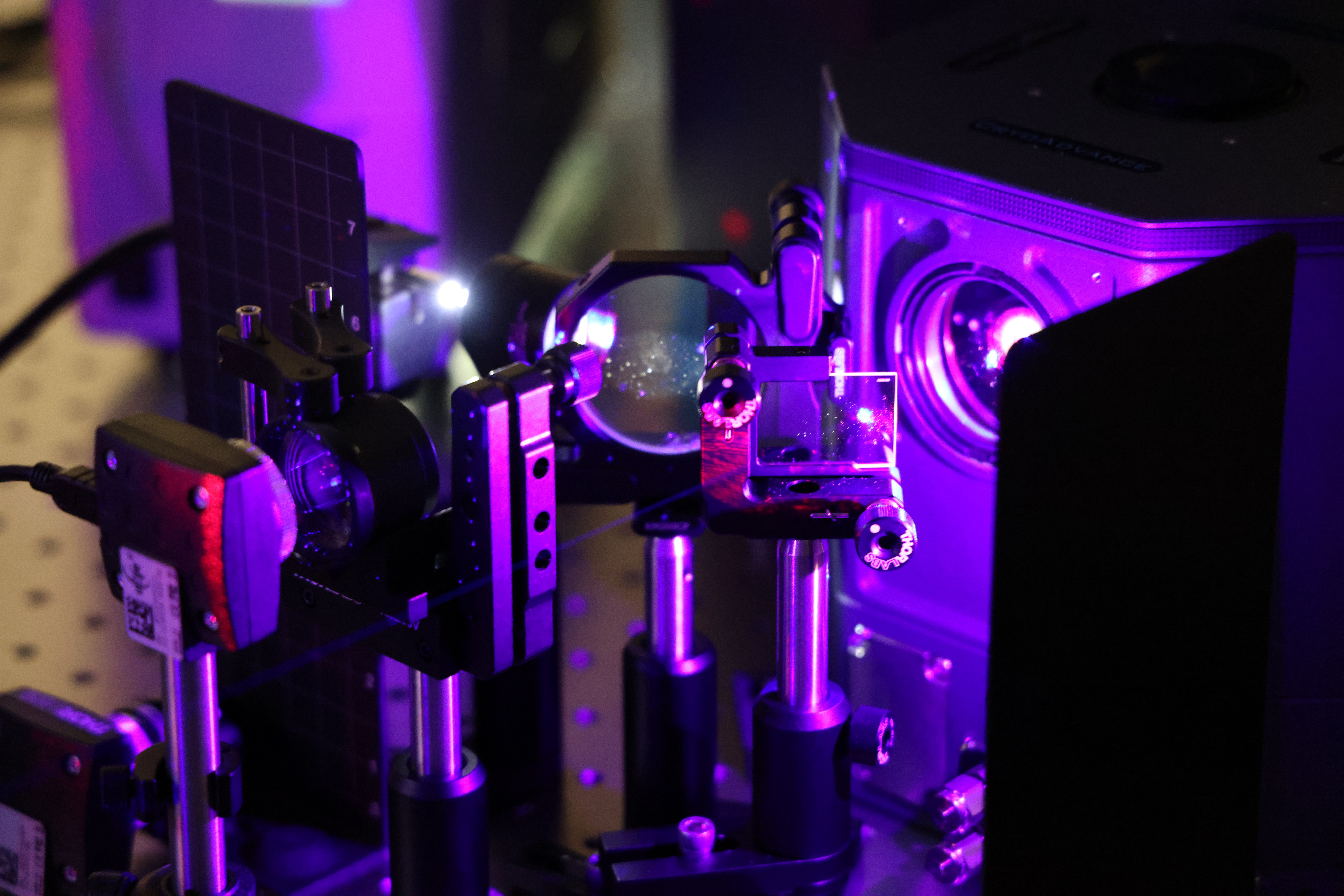 Scientists experiment with phonons at room temperature in the Air Force Research Laboratory’s Quantum Photonics Laboratory, part of AFRL’s Materials and Manufacturing Directorate, Wright-Patterson Air Force Base, Ohio. (U.S. Air Force photo / Micah Hung)