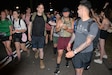 Capt. Kyle Simonson, Sgt. Anthony Perez and Spc. Jack Wicklander work their way through the crowds at the beginning of the second day of the “de 4 Daagse” an international four-day marching event in Nijmegen, Netherlands.