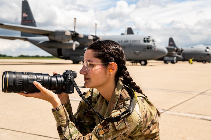 Airman taking photographs.