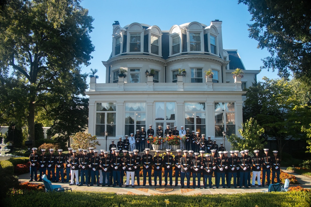 The 2022 Marine Rifle Squad Winners meet with General David H. Berger, the 38th Commandant of the Marine Corps, and Sgt. Maj. Troy E. Black, the 19th Sergeant Major of the Marine Corps, outside the Home of the Commandants at Marine Barracks Washington, D.C., Aug. 12, 2022. The rifle squads were made up of infantry Marines from across the 4 Infantry Divisions in the Marine Corps. (U.S. Marine Corps photo by Lance Cpl. Pranav Ramakrishna)