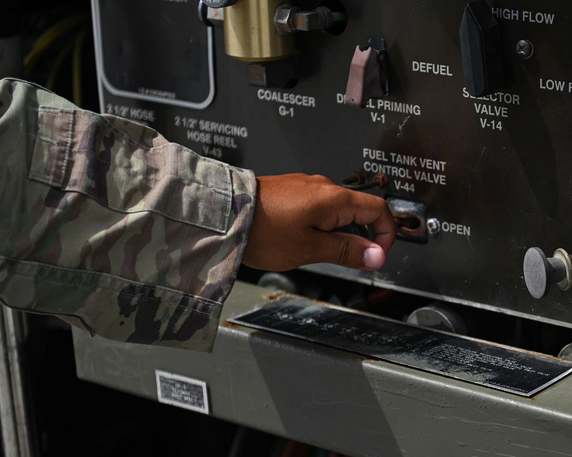U.S. Air Force Senior Airman Austin Martinez, 36th Logistics Readiness Squadron fuel distribution technician, opens the fuel tank vent control valve on an R-11 Refueler on Andersen Air Force Base, Guam, Aug. 16, 2022. The R-11 Refueler’s fuel tank holds a maximum capacity of 6,000 gallons of fuel that can be issued to an aircraft at a rate of 600 gallons per minute. (U.S. Air Force photo by Airman Spencer Perkins)