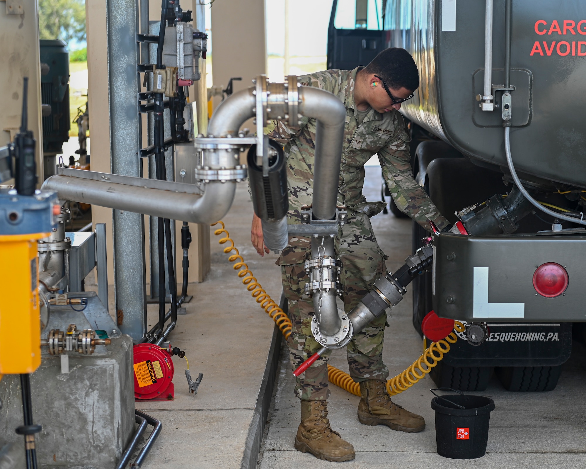 U.S. Air Force Senior Airman Andre Andersen, 36th Logistics Readiness Squadron fuel distribution operator, refuels an R-11 Refueler on Andersen Air Force Base, Guam, Aug. 16, 2022.