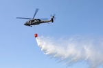 Virginia National Guard Soldiers assigned to 2nd Battalion, 224th Aviation Regiment, 29th Infantry Division conduct helicopter bucket aerial firefighting training near Gjilan, Kosovo, June 2, 2022.