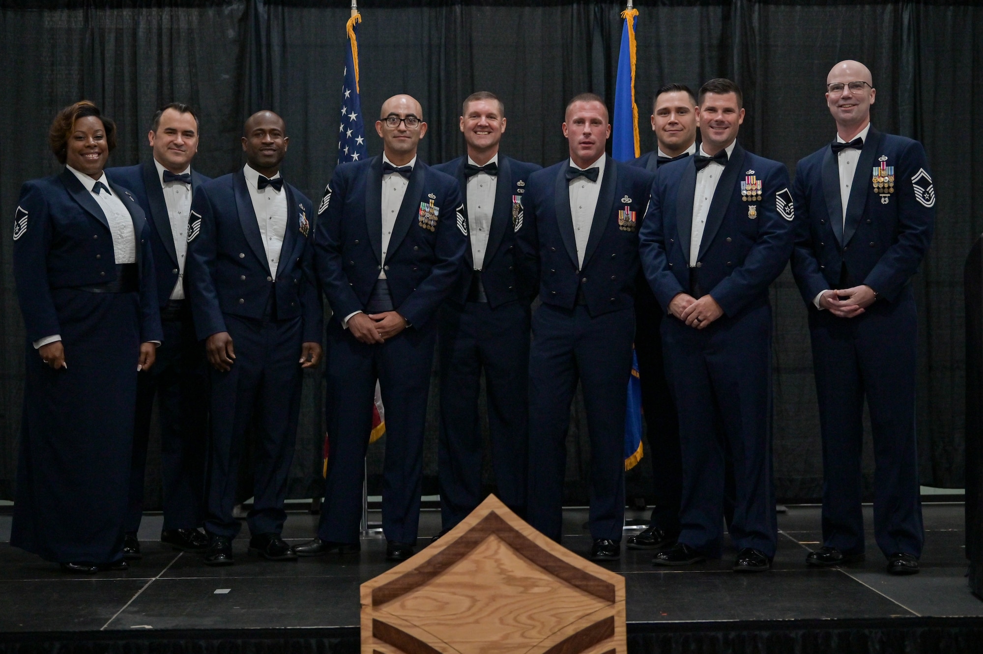 U.S. Air Force senior non-commissioned officers pose for a group photo during the SNCO induction ceremony at the Rainwater Conference Center, Valdosta, Georgia, Aug. 12, 2022. These SNCOs were a part of the planning committee for the event. The inductees have shown their strength and perseverance, and the U.S. Air Force has put their trust in these experienced and skilled Airmen, allowing them to progress to the next level. (U.S. Air Force photo by Senior Airman Rebeckah Medeiros)