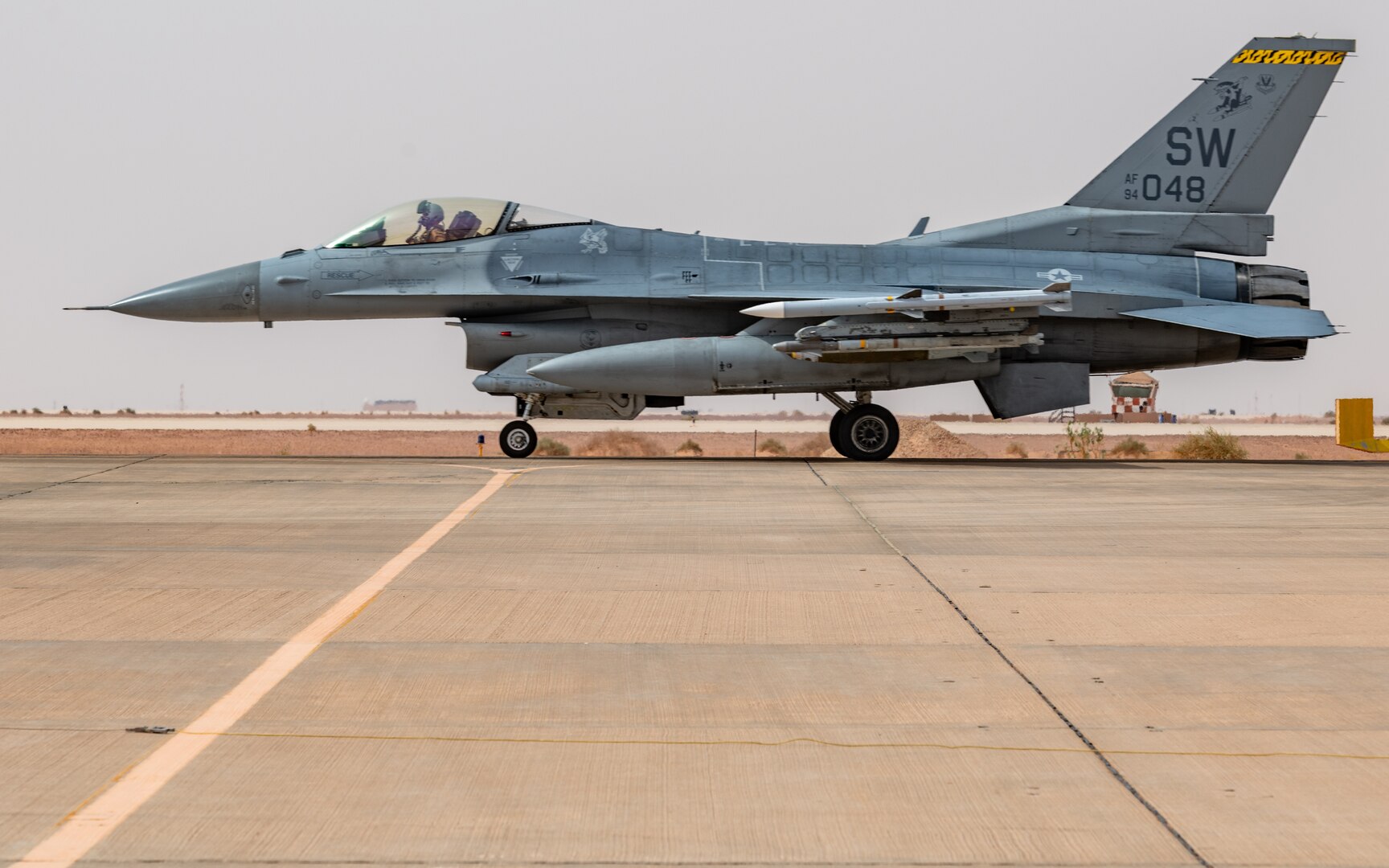 A U.S. Air Force F-16CJ Fighting Falcon, assigned to the 79th Expeditionary Fighter Squadron, taxis after landing on Prince Sultan Air Base, Kingdom of Saudi Arabia, July 26, 2022. The 378th Expeditionary Operation Support Squadron’s Airfield Management flight is responsible for checking the airfield for discrepancies that’d prevent aircraft from efficiently arriving and departing safely and effectively from PSAB. (U.S. Air Force photo by Staff Sgt. Noah J. Tancer)