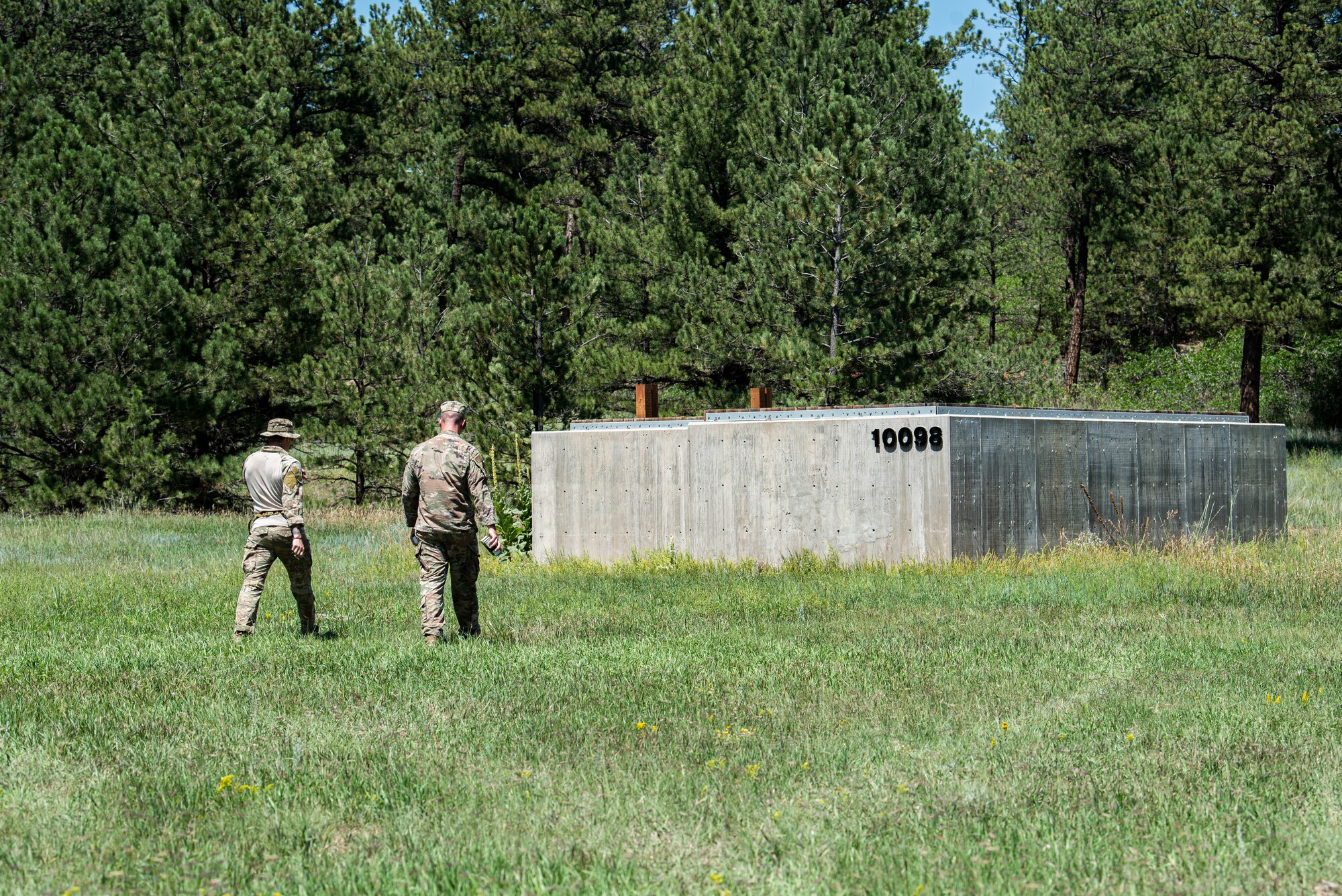 Men walking in field