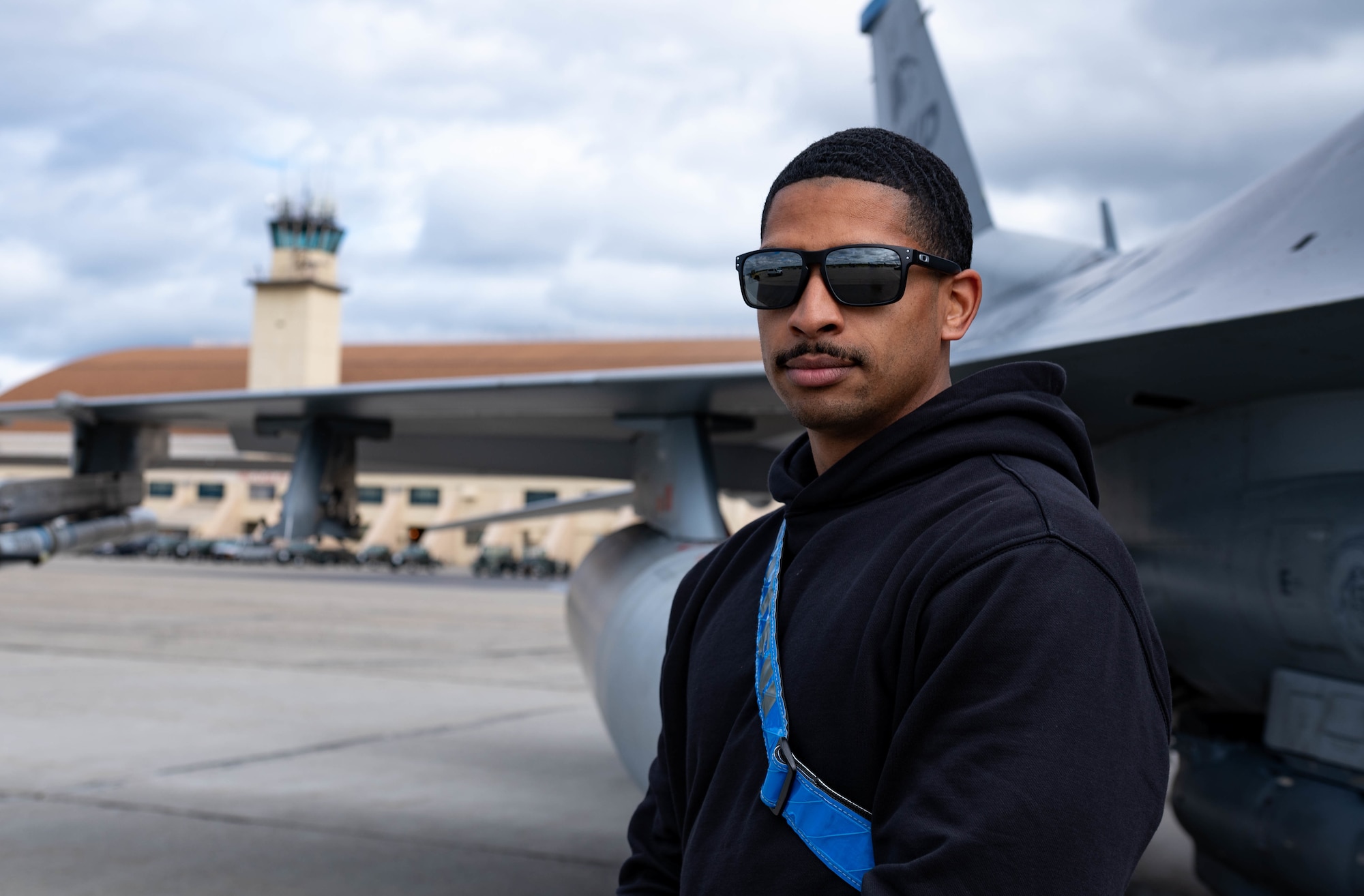 A troop shows off their mustache while at RED FLAG-Alaska