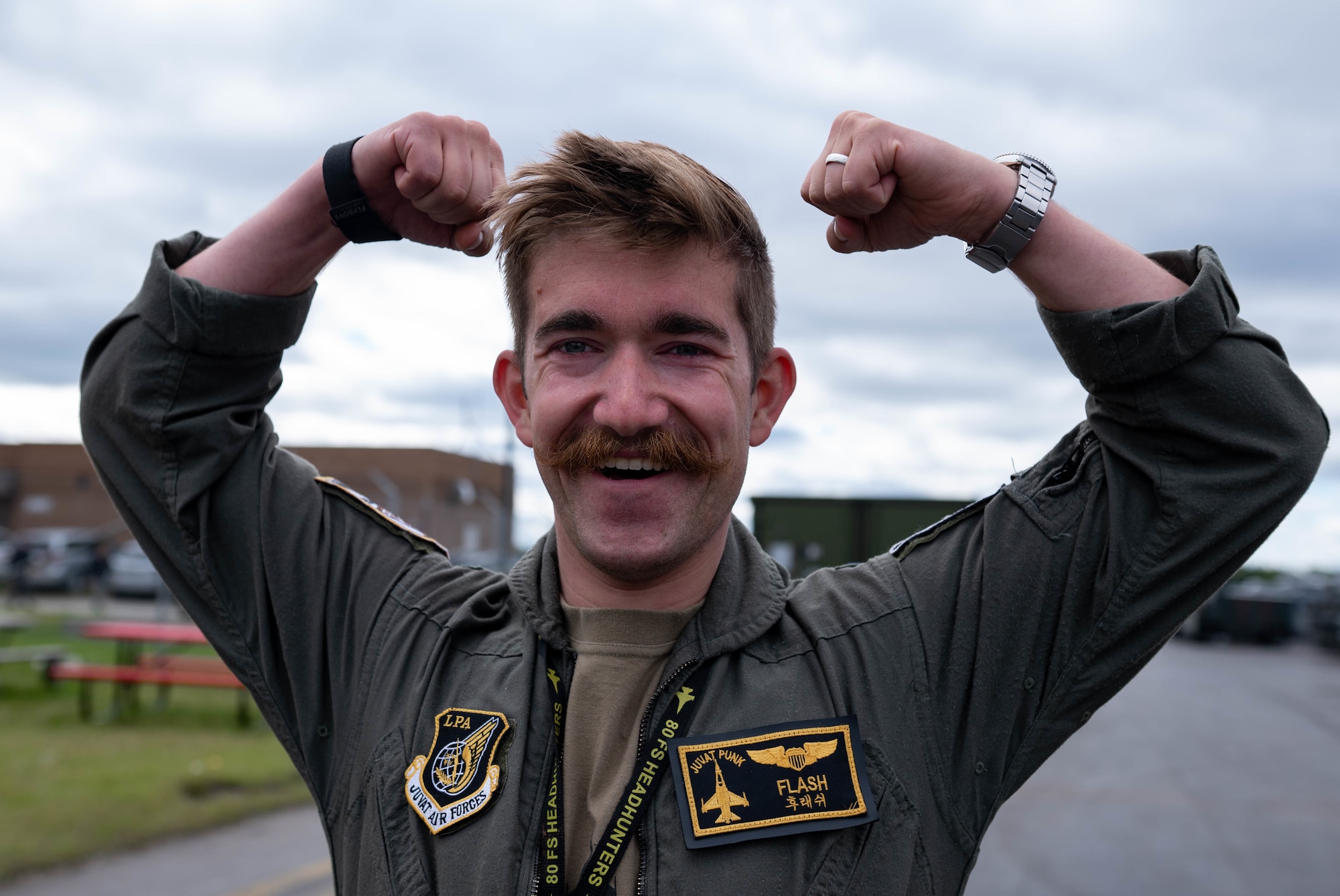 A troop shows off their mustache while at RED FLAG-Alaska