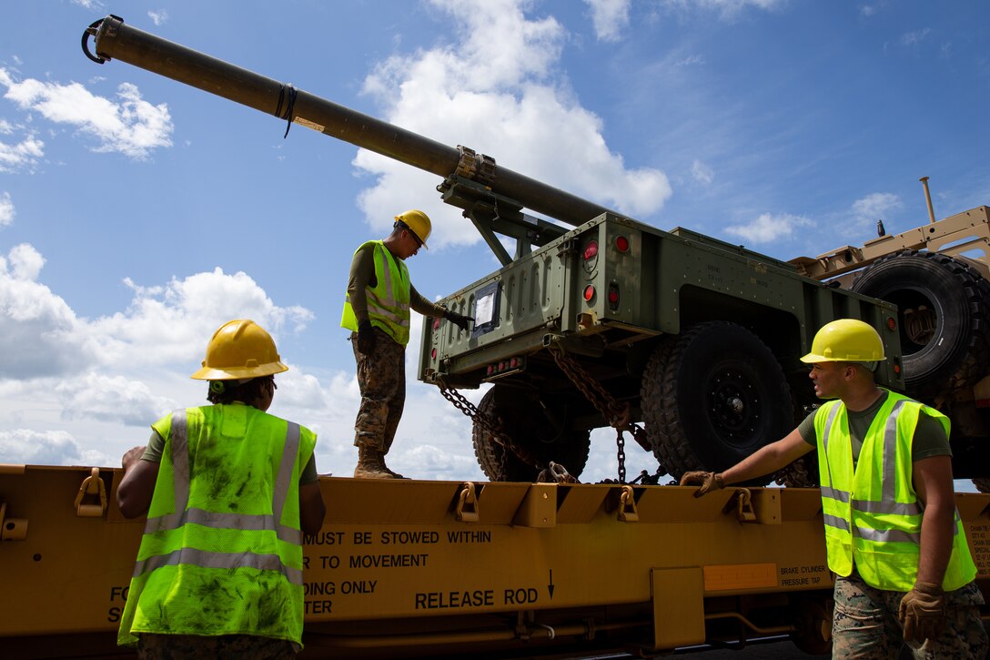 U.S. Marines with 2nd Supply Battalion verify equipment information at Morehead City, North Carolina, Aug. 17, 2022. The Marines of 2nd Marine Logistics Group (MLG) facilitated the transportation of 2nd Marine Aircraft Wing (MAW) vehicles and equipment via train to Yuma, Arizona, in support of Weapons and Tactics Instructor course. 2nd MLG and 2nd MAW are the logistics combat element and aviation combat element of II Marine Expeditionary Force. (U.S. Marine Corps photo by Lance Cpl. Elias E. Pimentel III)