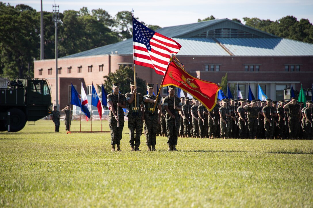Marines of the II Marine Expeditionary Force color guard renders honor to U.S. Marine Corps General David H. Berger, the 38th commandant of the Marine Corps, during the II MEF change of command ceremony on Marine Corps Base Camp Lejeune, North Carolina, August 18, 2022.  U.S. Marine Corps Lt. Gen. William M. Jurney relinquished command to Lt. Gen. David A. Ottignon. (U.S. Marine Corps photo by Lance Cpl. Joshua Crumback)