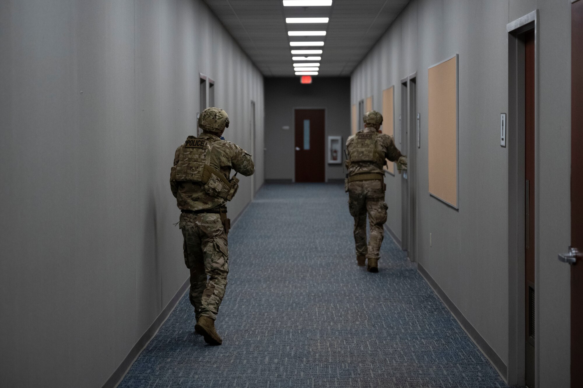 Airmen assigned to the 4th Security Forces Squadron sweep a building during an active shooter exercise at Seymour Johnson Air Force Base, North Carolina, Aug. 19, 2022. Active shooter exercises are required to be conducted at least twice annually to test Airmen’s skills and reaction to these scenarios.