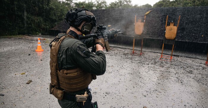 U.S. Marine Corps Cpl. Dylan Diamond, a team leader with Special Reaction Team, Headquarters and Support Battalion, Marine Corps Installations Pacific, fires an M4A1 Carbine during multiple weapons sustainment training on Camp Hansen, Okinawa, Japan, Aug. 11, 2022. The members of SRT are attached to the Provost Marshal’s Office and are specifically trained and equipped to react in scenarios like an active shooter, hostage situations, and barricaded subjects.