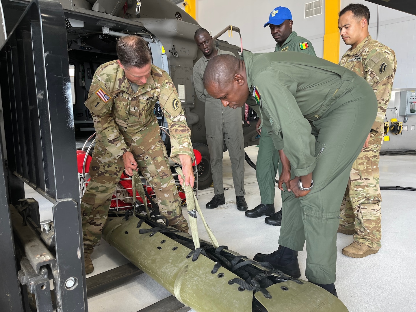 The Vermont Army National Guard hosted three Senegalese Air Force pilots July 17-22,2022, to conduct safety, operations, and maintenance cross-training with VTARNG’s Aviators during a State Partnership Program visit. The Department of Defense’s State Partnership Program pairs U.S. state National Guard units with other nations to facilitate international civil-military relationships. U.S. Army National Guard photo by Sgt. 1st Class Jason Alvarez)