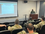 Senegal Air Force Capt. Kana Ndiaye, a helicopter pilot, briefs Vermont Army National Guard Blackhawk pilots during a State Partnership Program visit to the Army Aviation Flight Facility, Burlington, Vermont. The Vermont Army National Guard hosted three Senegalese Air Force pilots July 17-22, 2022, to conduct safety, operations, and maintenance cross-training with VTARNG’s Aviators during the trip. The Department of Defense’s State Partnership Program pairs U.S. state National Guard units with other nations to facilitate international civil-military relationships. (U.S. Army National Guard photo by Sgt. 1st Class Jason Alvarez)