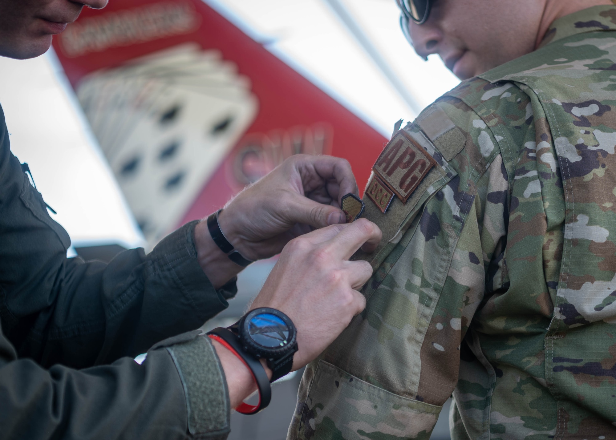 photo of Airman receiving patch