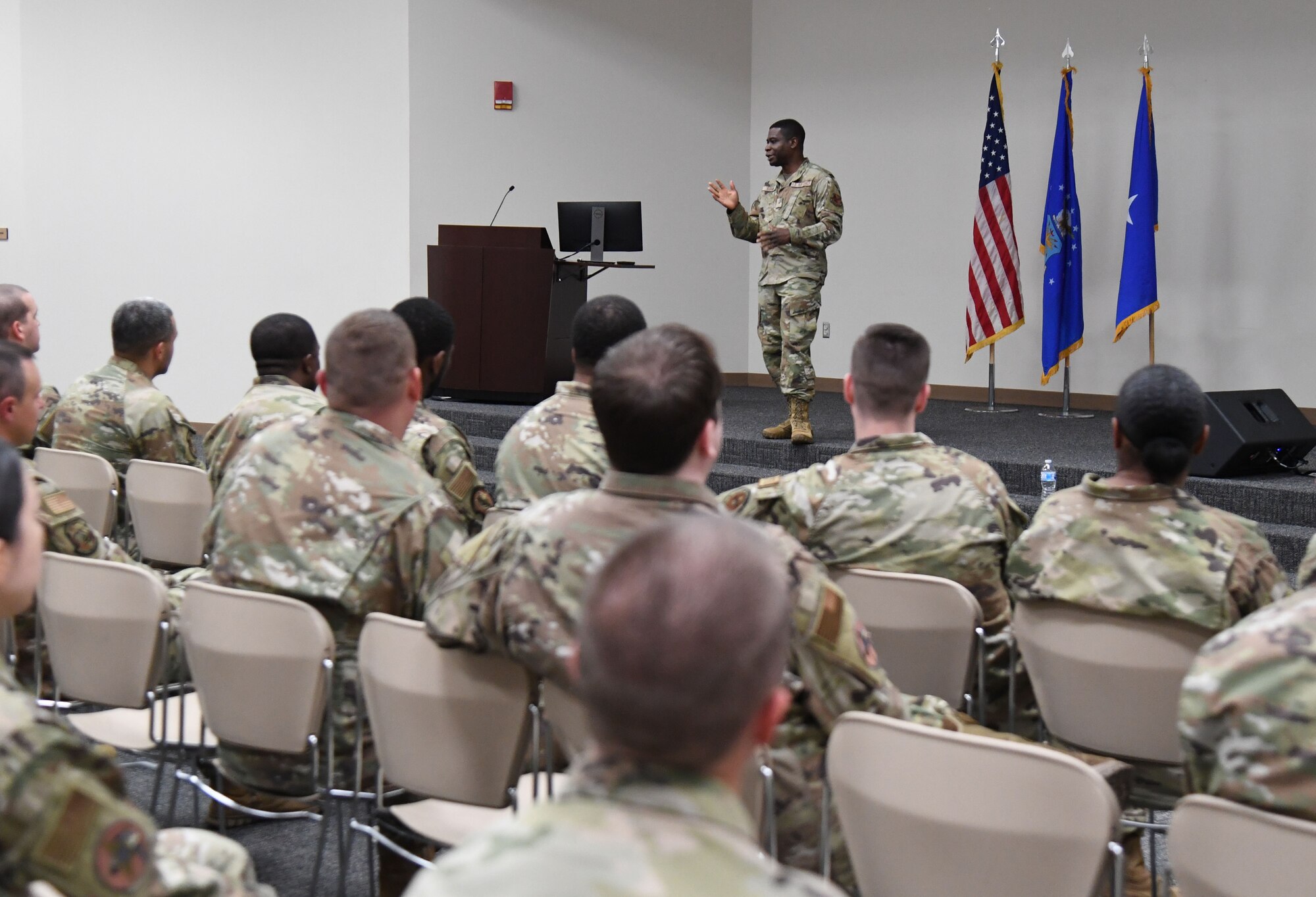 U.S. Air Force Brig. Gen. Terrence Adams, Special Assistant, Cyber Effects Operations, Headquarters U.S. Air Force, the Pentagon, Arlington, Virginia, speaks with members of the 336th Training Squadron during an enlisted all-call in the Roberts Consolidated Aircraft Maintenance Facility at Keesler Air Force Base, Mississippi, August 15, 2022. Adams also toured the 333rd Training Squadron and 336th Training Squadron to meet and greet squadron personnel, understand the squadron's mission and be briefed on new innovations. (U.S. Air Force photo by Kemberly Groue)