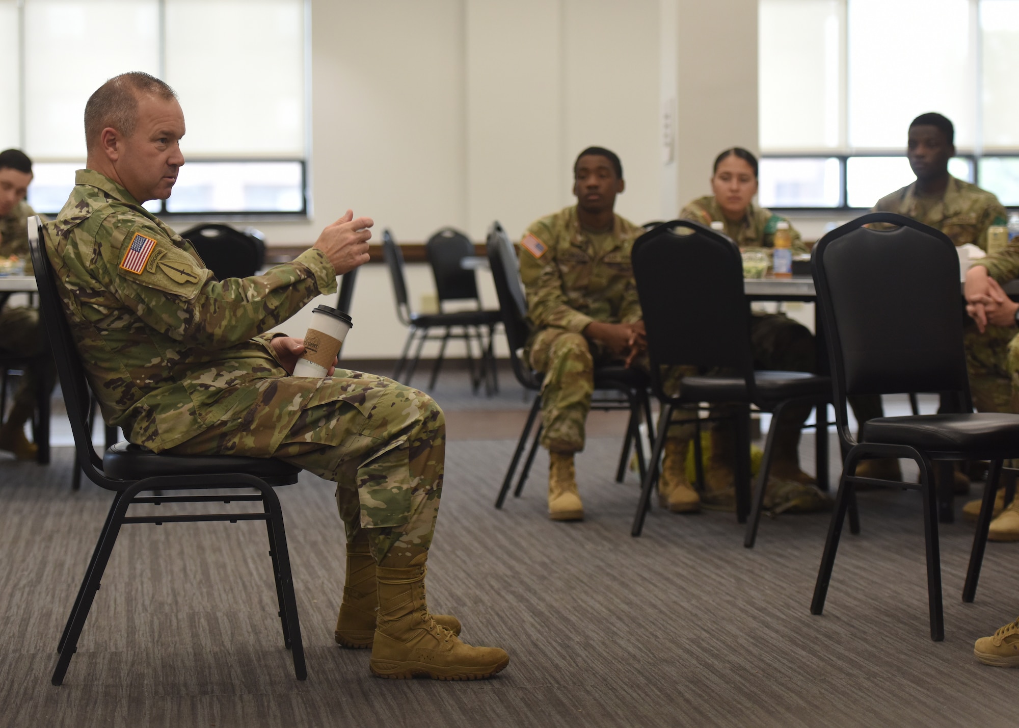 U.S. Army Maj. Gen. Anthony Hale, commanding general of the U.S. Army Intelligence Center of Excellence, talks with 344th Military Intelligence Battalion students at Goodfellow Air Force Base, Texas, August 18, 2022. Hale received input from the students on how to improve the learning environment. (U.S. Air Force photo by Airman 1st Class Zachary Heimbuch)