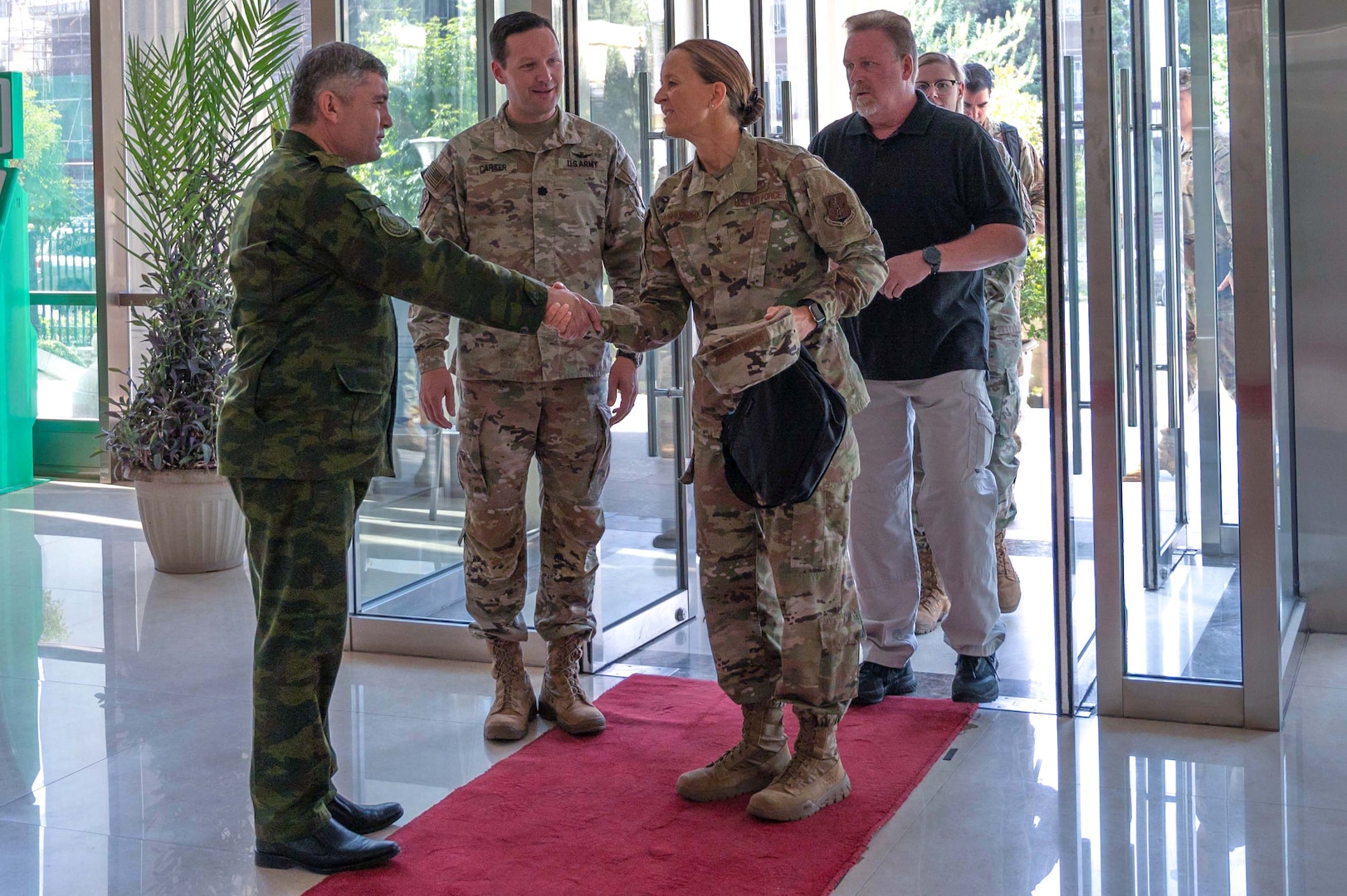 Maj. Gen. Kerry Muehlenbeck, The Adjutant General-Arizona, is greeted by Tajikistan officials as she tours the Exercise REGIONAL COOPERATION 22 training site to observe the exercise and visit Arizona Army and Air National Guard participants. (U.S. Air National Guard photo by Maj. Angela Walz)