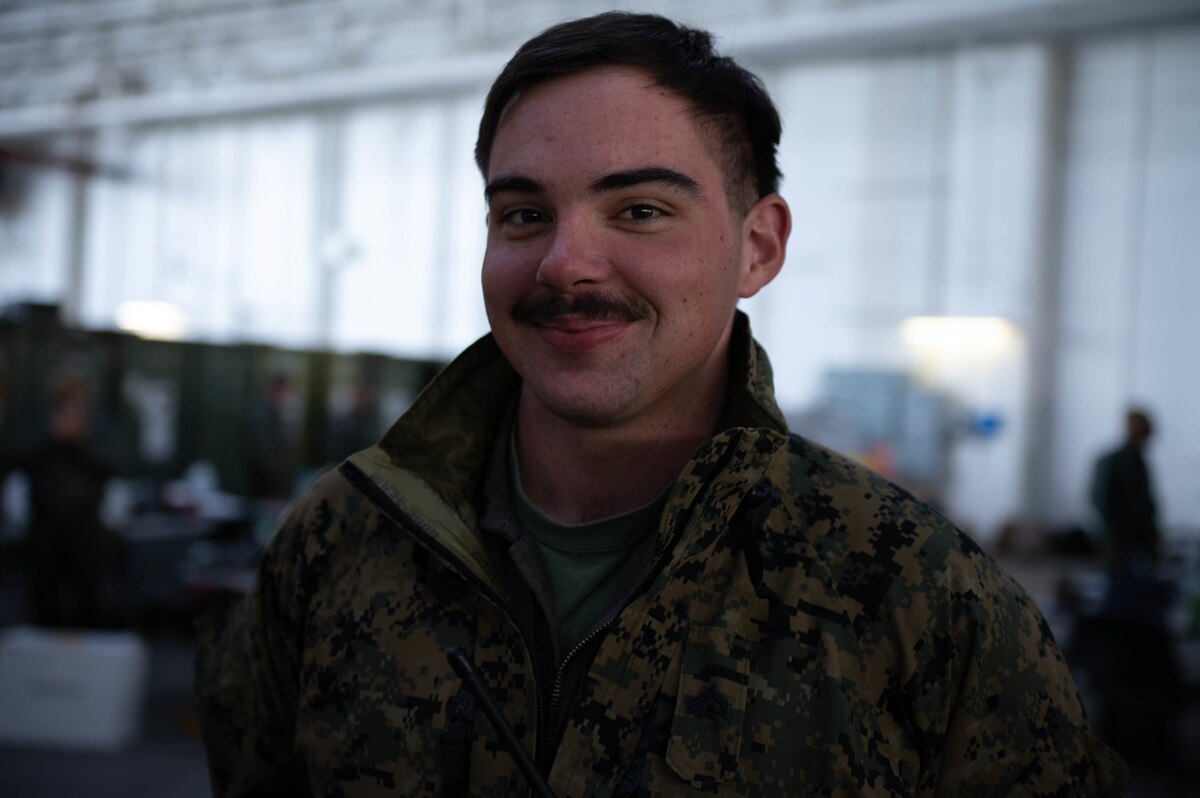 A troop shows off their mustache while at RED FLAG-Alaska