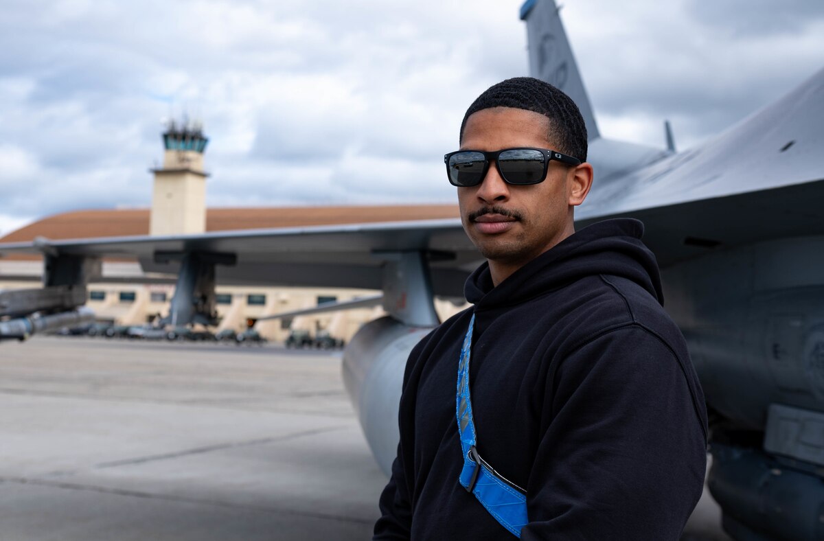 A troop shows off their mustache while at RED FLAG-Alaska