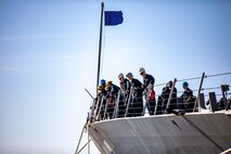 Sailors look on from the fo’c’sle of the Arleigh Burke-class guided-missile destroyer USS Paul Ignatius (DDG 117) as the ship arrives in Tallinn, Estonia for a scheduled port visit, Aug. 20, 2022.