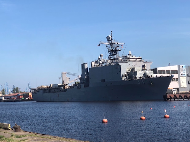 The Whidbey Island-class dock landing ship USS Gunston Hall (LSD 44) sits pierside in Riga, Latvia during a scheduled port visit, Aug. 20, 2022.