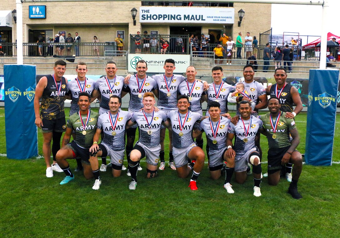 All-Army Rugby team holding their gold medals after the conclusion of the 2022 Armed Forces Sports Men's Rugby Championship held in conjunction with the Rugbytown 7's Rugby Tournament in Glendale, Colo.  Championship features teams from the Army, Marine Corps, Navy, Air Force (with Space Force players), and Coast Guard. (Department of Defense photo by Mr. Steven Dinote).