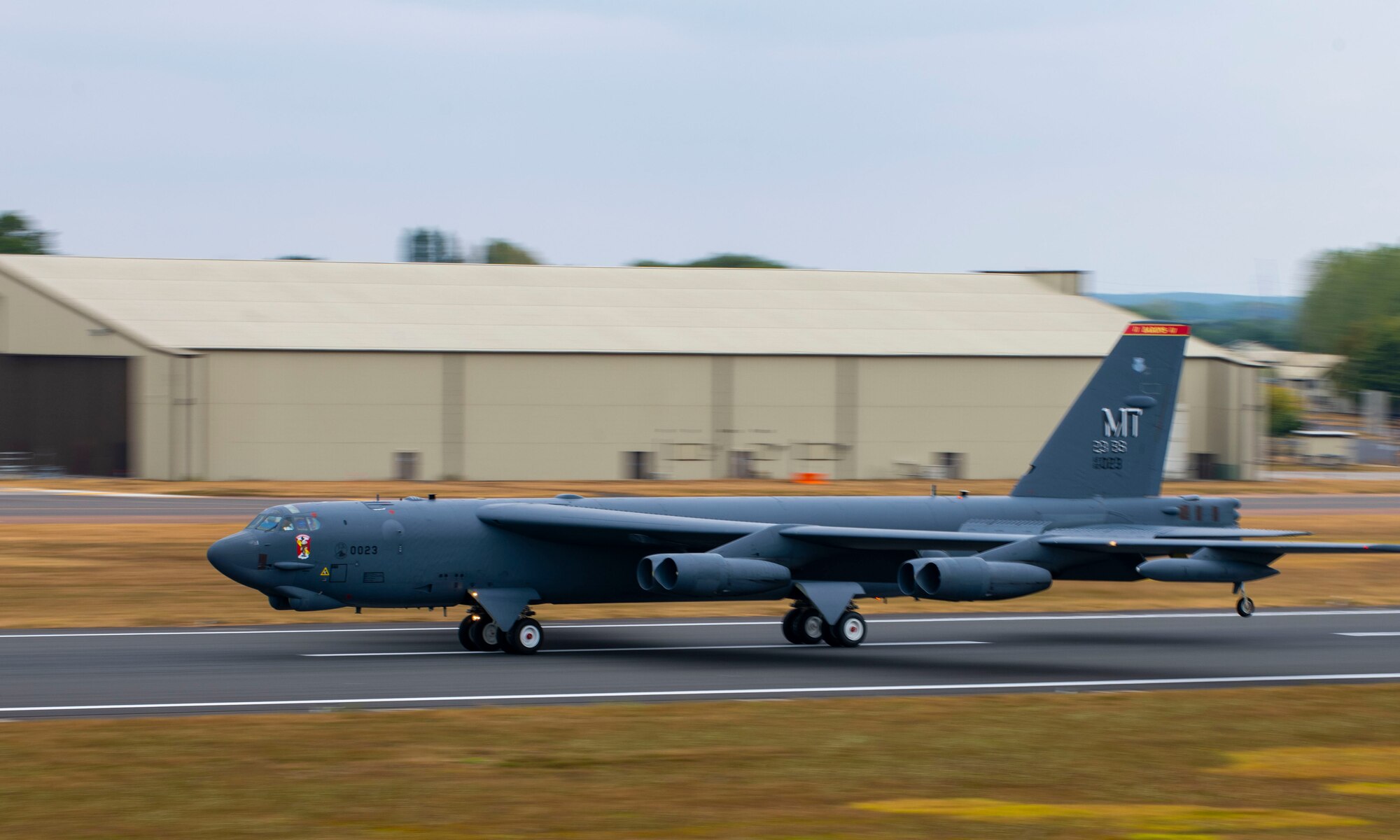 A U.S. Air Force B-52 Stratofortress aircraft, assigned to the 23rd Expeditionary Bomb Squadron, lands on RAF Fairford