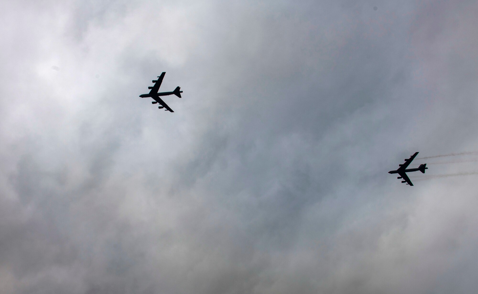Two B-52 Stratofortress aircraft, assigned to the 23rd Expeditionary Bomb Squadron, fly over RAF Fairford
