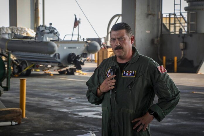 220822-A-EQ028-1131 MANAMA, Bahrain (Aug. 22, 2022) Capt. David Skarosi, incoming commanding officer for the gold crew of expeditionary sea base USS Lewis B. Puller (ESB 3), delivers remarks during a change-of-command ceremony in Manama, Bahrain, Aug. 22. Lewis B. Puller is forward-deployed to the U.S. 5th Fleet area of operations to help ensure maritime security and stability in the Middle East region.