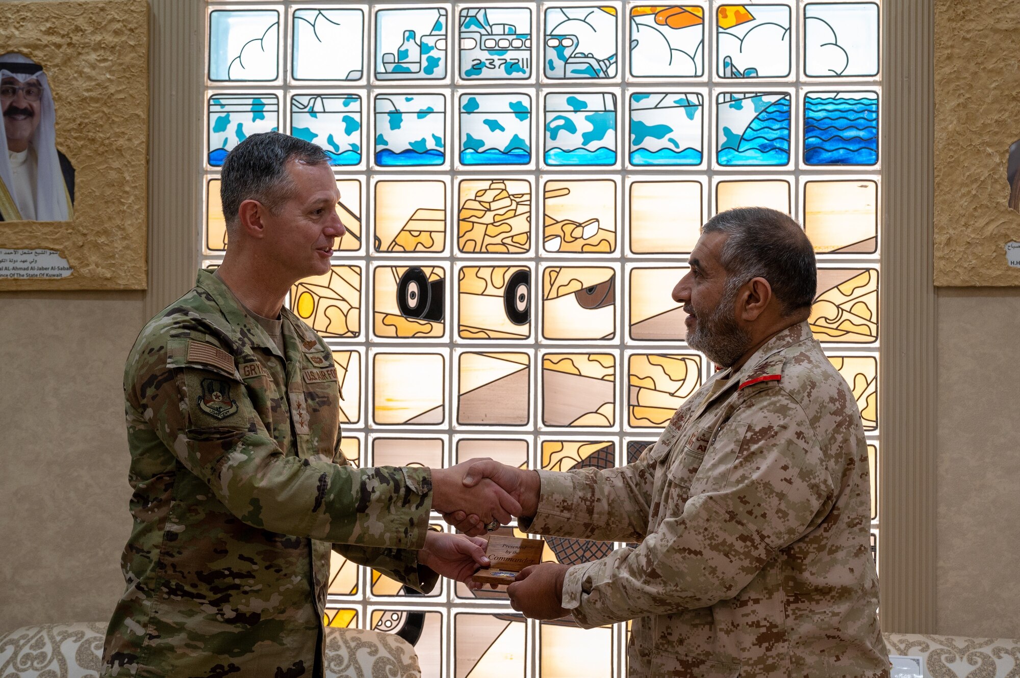 U.S. Air Force Lt. Gen. Alexus G. Grynkewich, left, Ninth Air Force (Air Forces Central) commander, presents a gift to His Excellency, Staff Lt. Gen. Khaled Saleh Al-Sabah, right, Chief of the General Staff of the Army of the State of Kuwait at the Kuwait Ministry of Defense, Aug. 17, 2022. During the visit, Grynkewich met with Kuwaiti military leaders to discuss the importance of resolute partnerships within the U.S. Central Command area of responsibility. (U.S. Air Force photo by Senior Airman Dominic Tyler)