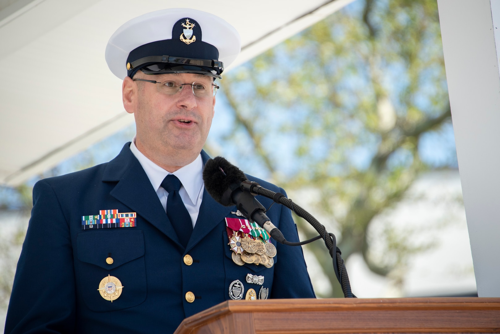 Master Chief Petty Officer of the Coast Guard Heath Jones delivers remarks during his Change of Watch ceremony in Cape May, New Jersey, May 19, 2022.