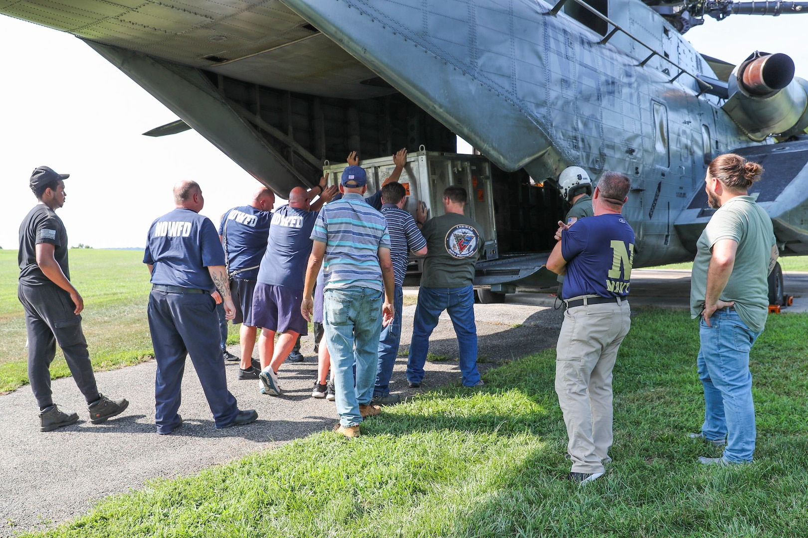 A shipment of critical F/A-18 aircraft CAD/PAD bound for Naval Air Station Oceana, Virginia, is loaded onto a U.S. Marine Corps CH-53E Super Stallion helicopter attached to Helicopter Mine Countermeasures Squadron 12 (HM-12). After an ejection seat manufacturer revealed a quality escape, NSWC Indian Head Division personnel identified acceptable assets and dispatched the replacements needed to maintain worldwide naval aviation readiness. (U.S. Navy photo)