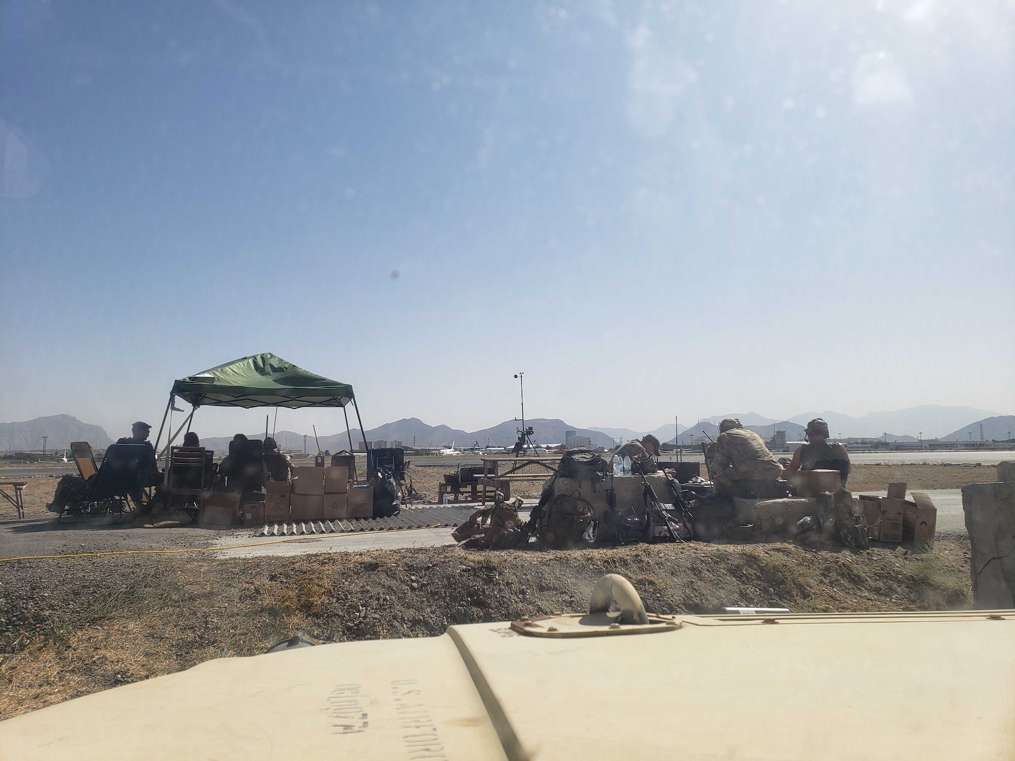 U.S. Marine Corps air traffic controllers operate out of a temporary tower August 2021, at Hamid Karzai International Airport (HKIA), Afghanistan.