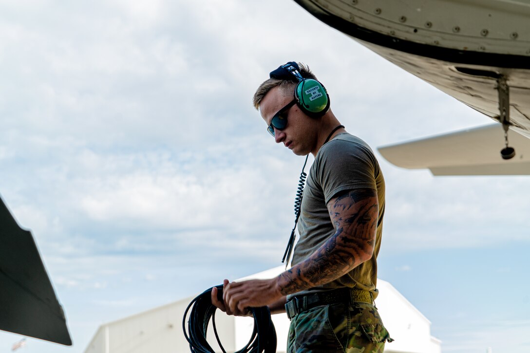 Maintenance crew chief conducts preflight check on a KC-135R Stratotanker.
