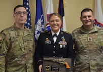 Recruiter of the Year accepts plaque award