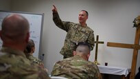 Alaska National Guard State Command Chaplain (Col.) Ted McGovern leads a Chapel Service for Alaska Guardsmen serving during drill weekend at the AKNG Armory on Joint Base Elmendorf-Richardson, Aug. 7, 2022. The service, focusing on watchfulness, paralleled the importance of readiness in the Guard. (Alaska National Guard photo by Mr. Dana Rosso)