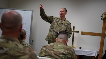 Alaska National Guard State Command Chaplain (Col.) Ted McGovern leads a Chapel Service for Alaska Guardsmen serving during drill weekend at the AKNG Armory on Joint Base Elmendorf-Richardson, Aug. 7, 2022. The service, focusing on watchfulness, paralleled the importance of readiness in the Guard. (Alaska National Guard photo by Mr. Dana Rosso)