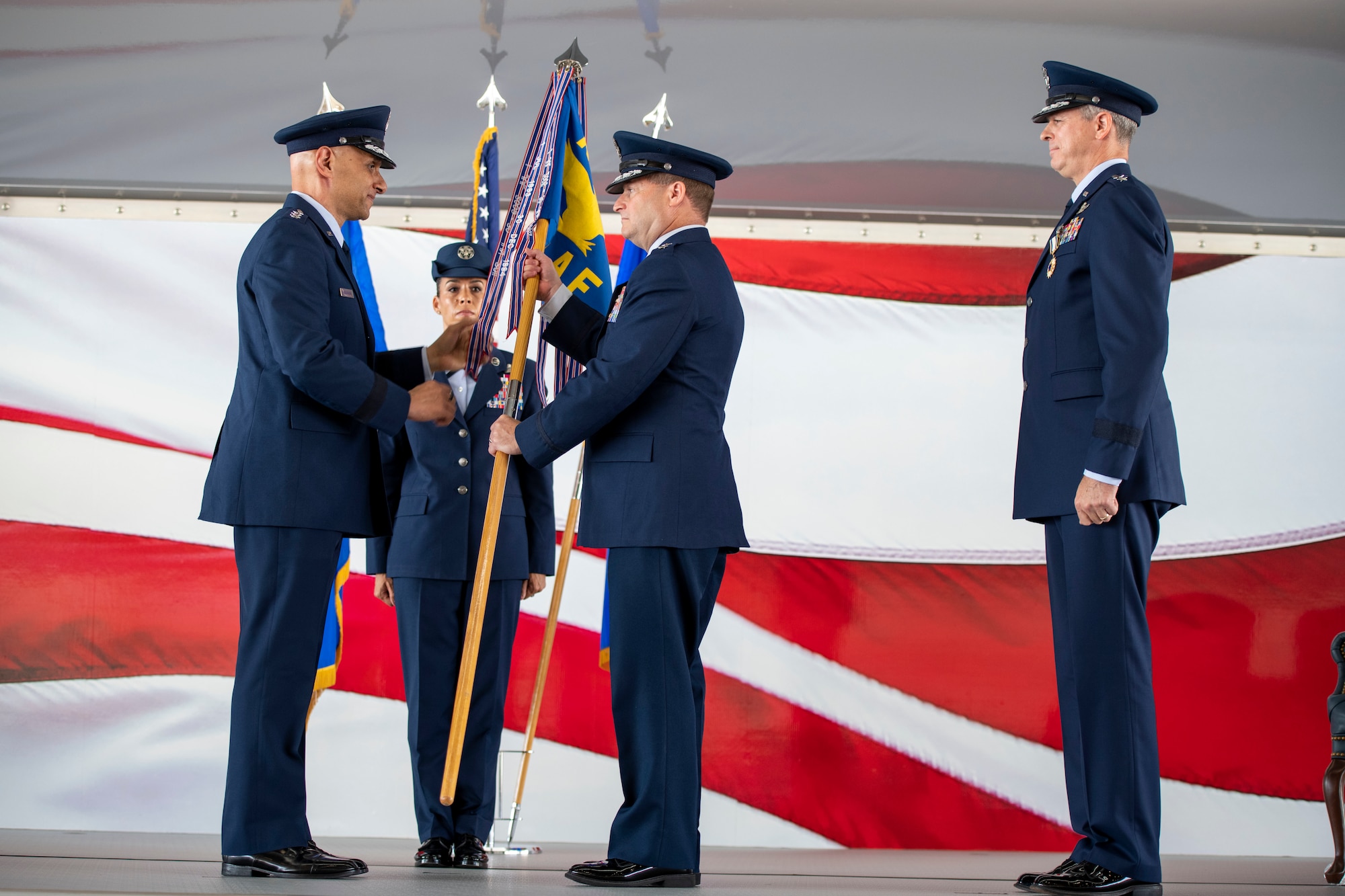 U.S. Air Force Maj. Gen. Phillip Stewart, 19th Air Force commander, at right, receives the unit guidon from Lt. Gen. Brian Robinson, commander of Air Education Training Command, during the 19th Air Force change of command ceremony Aug. 19, 2022, at Joint Base San Antonio-Randolph, Texas. Stewart is responsible for monitoring production and oversees top level instruction and flying operations manning, contracts, logistics and maintenance trends. (U.S. Air Force photo by Jonathan Mallard)
